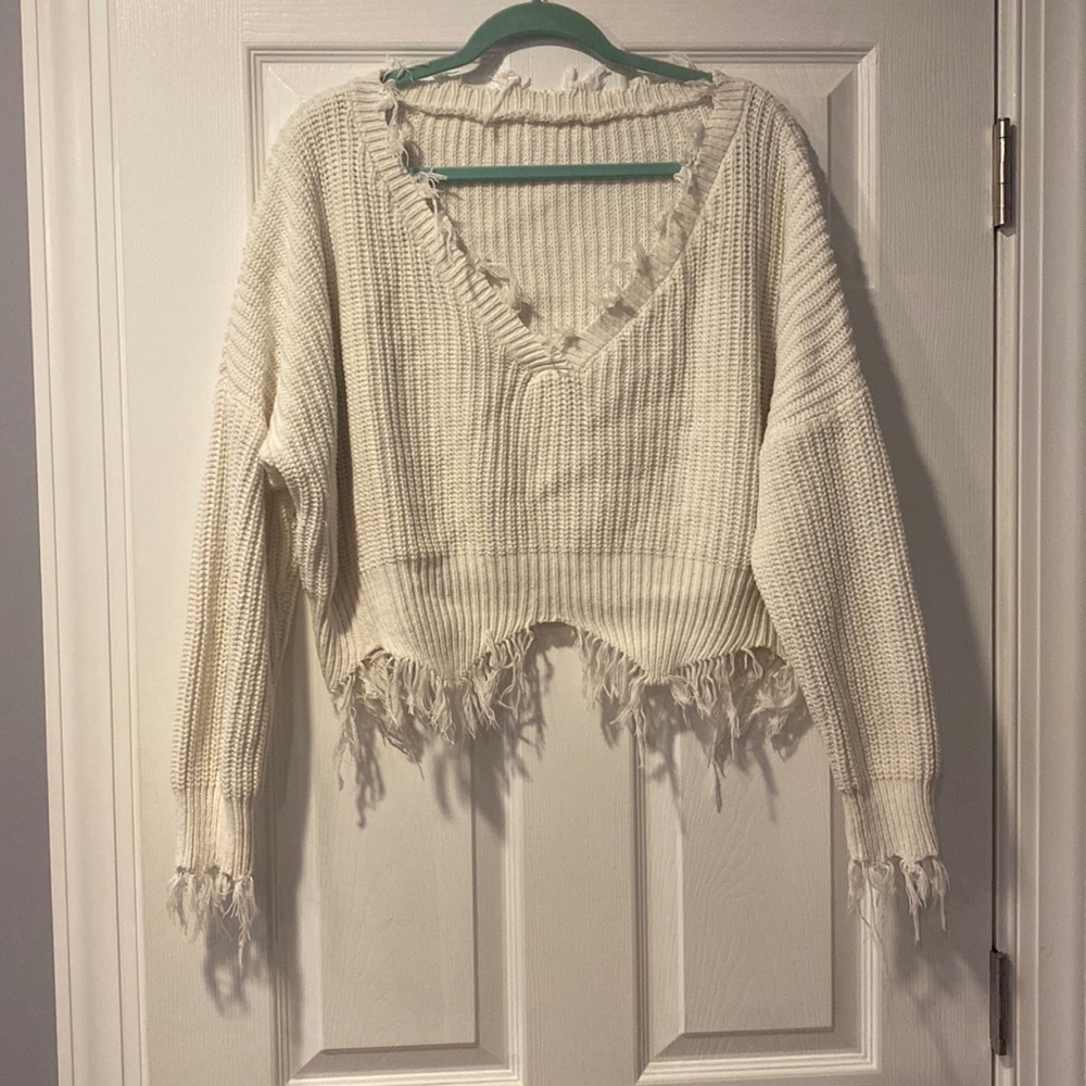 Distressed v neck sweater